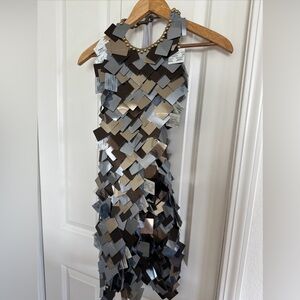 Houston-based Interior Designer one-of-a-kind backless dress with headpiece.